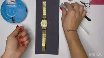 Замена батарейки на часах “Swatch”